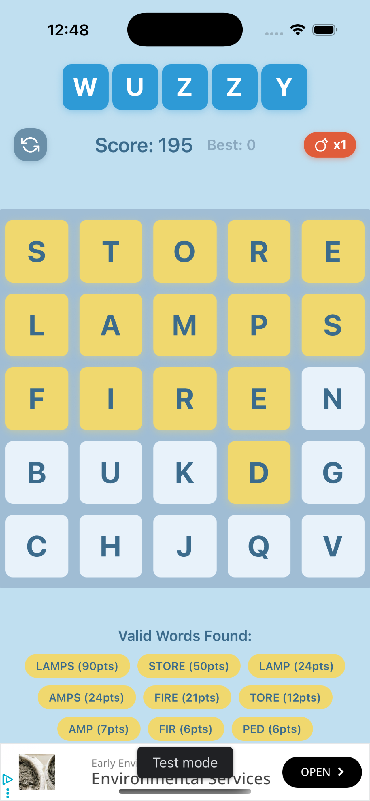 WUZZY gameplay — word chips appear below the grid